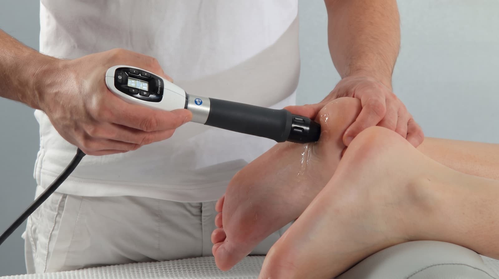 Focused sound wave therapy device in use